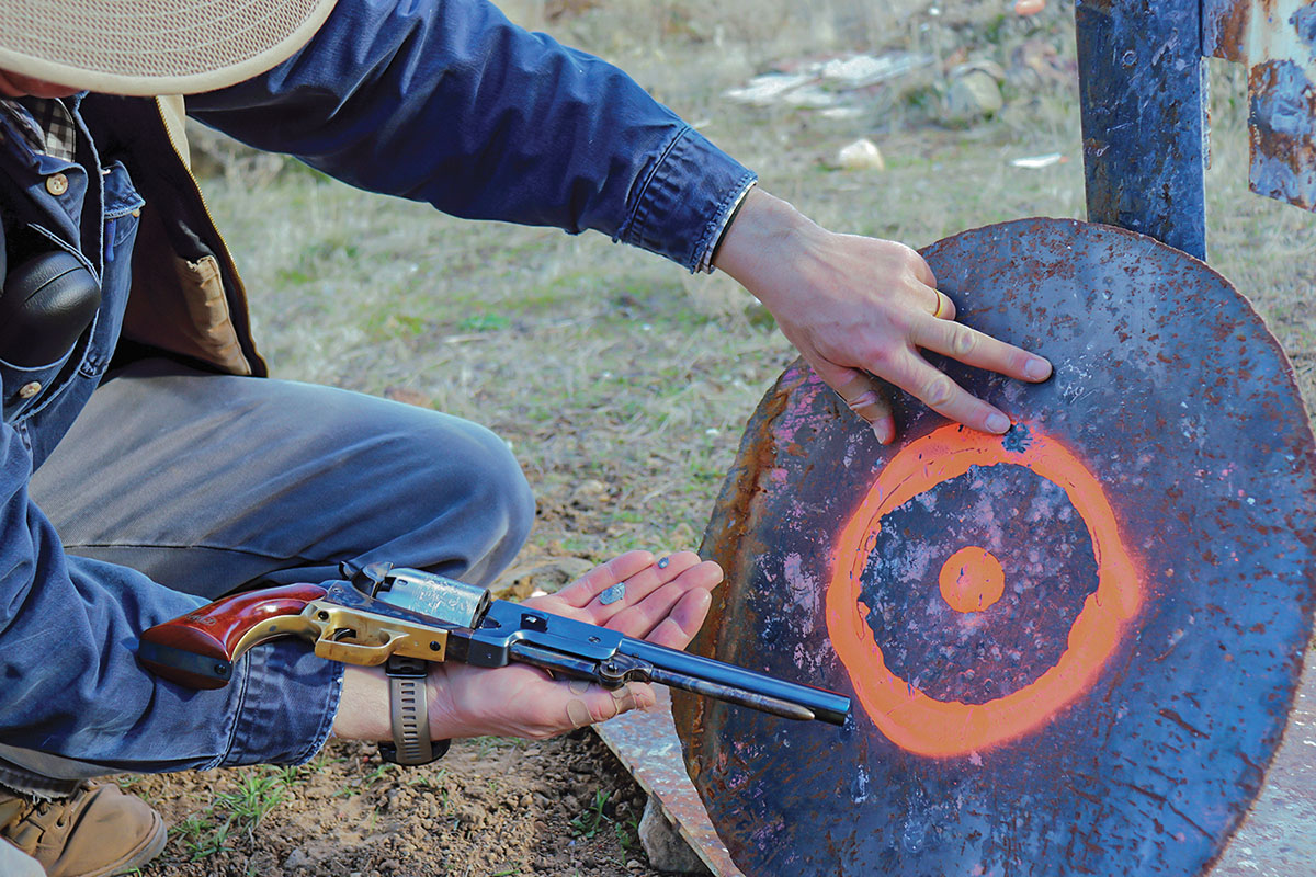 Roundball splatters on steel from 20 yards. The Walker Colt is capable of holding 60 grains of black  powder in each of its 44-caliber chambers.